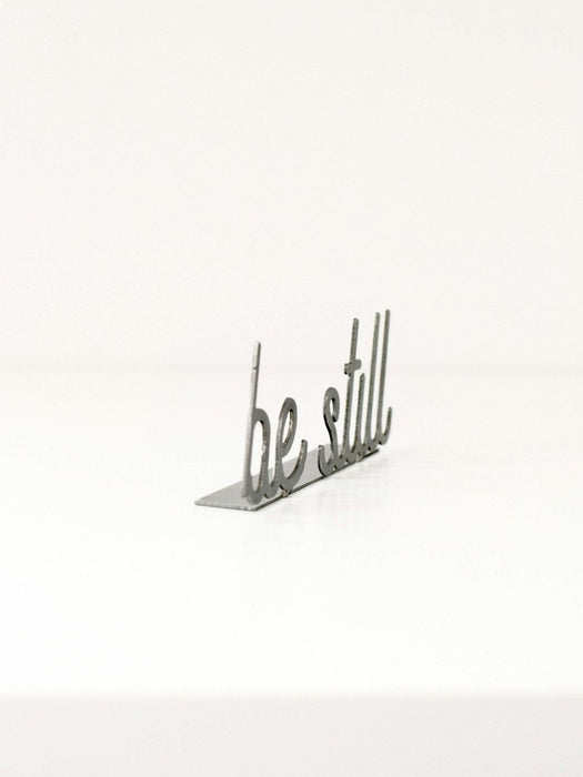 Be Still Word Sign by Jubilee Trading Company