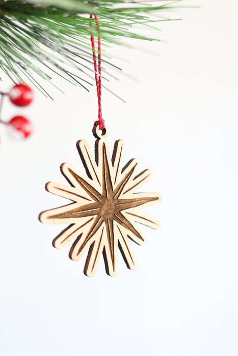 Starlight Ornament by Jubilee Trading Company