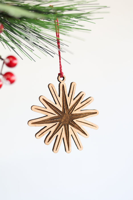 Starlight Ornament by Jubilee Trading Company