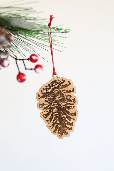 Round Pinecone Ornament by Jubilee Trading Company